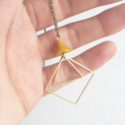 Yellow and brass necklace, glass flower pendant, geometric modern necklace