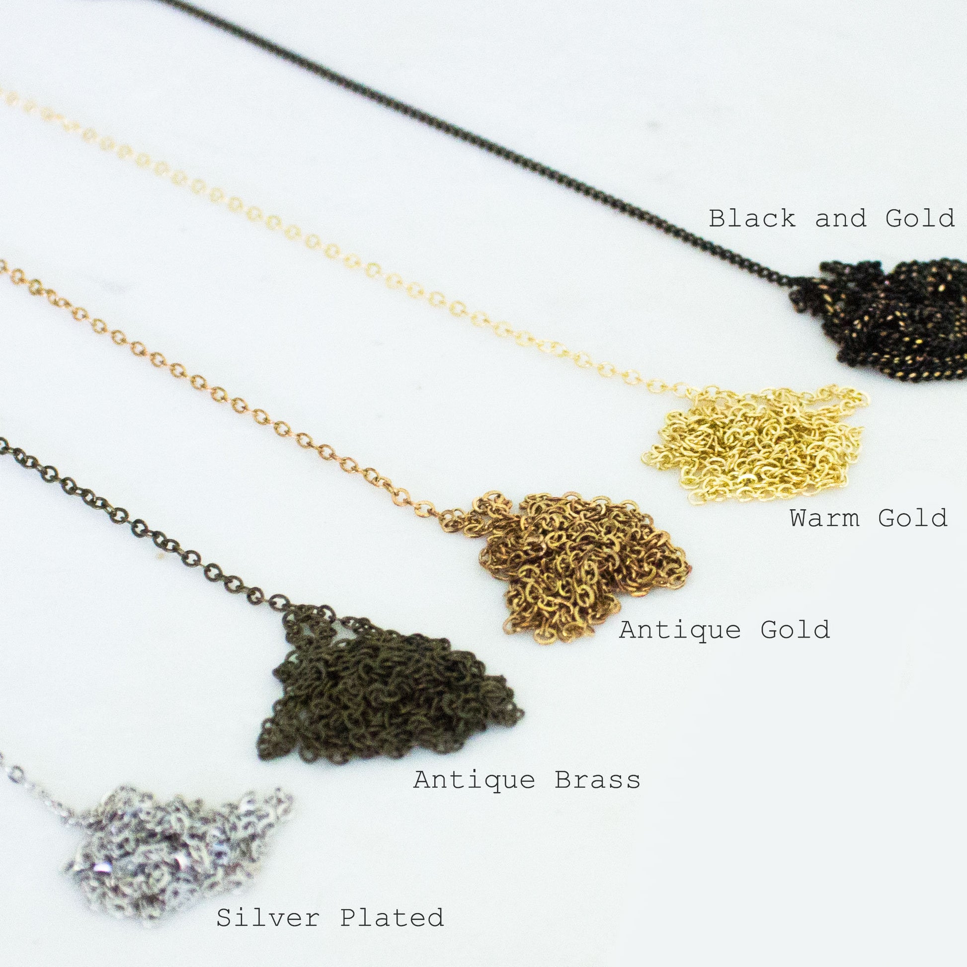 5 different chain options, silver plated, antique brass, antique gold, warm gold and black and gold